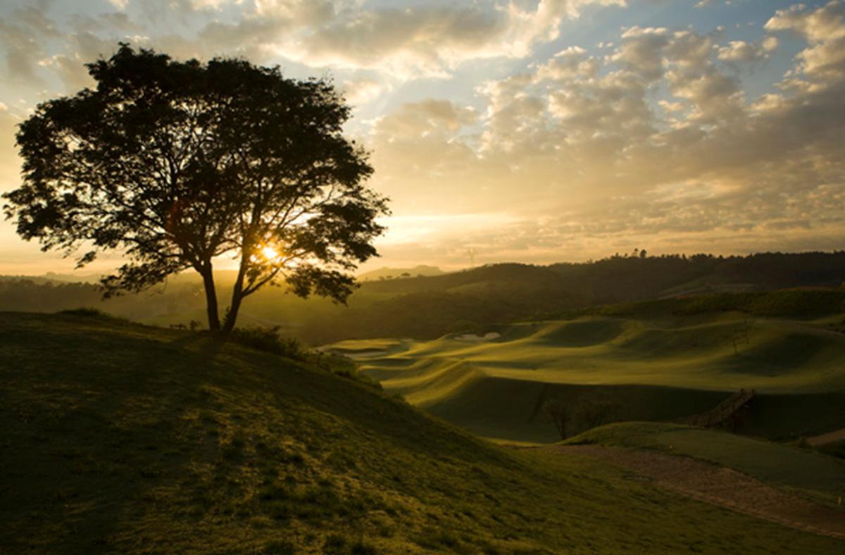 Sunset at Vista Verde shows the very beautiful shaping of the opening hole.   Almost 2,000,000 cubic yards of earth were moved to create this dramatic golf course.