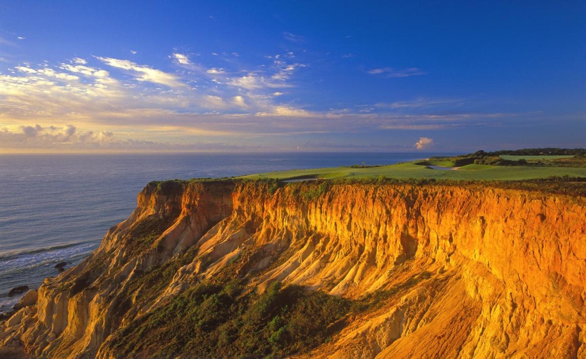 On more than one occasion, the par three #14 at Terravista G.C. near Trancoso, Bahia, has been listed as one of the 10 most beautiful par threes is the world by Golf Digest Magazine.   The amazing setting is why.  This 216 yard hole sits on the red cliffs where Brazil was first discovered by Portuguese sailors over 500 years ago.   The altantic coastal views are panoramic from the green almost 150 feet above the beach and Atlantic ocean. 